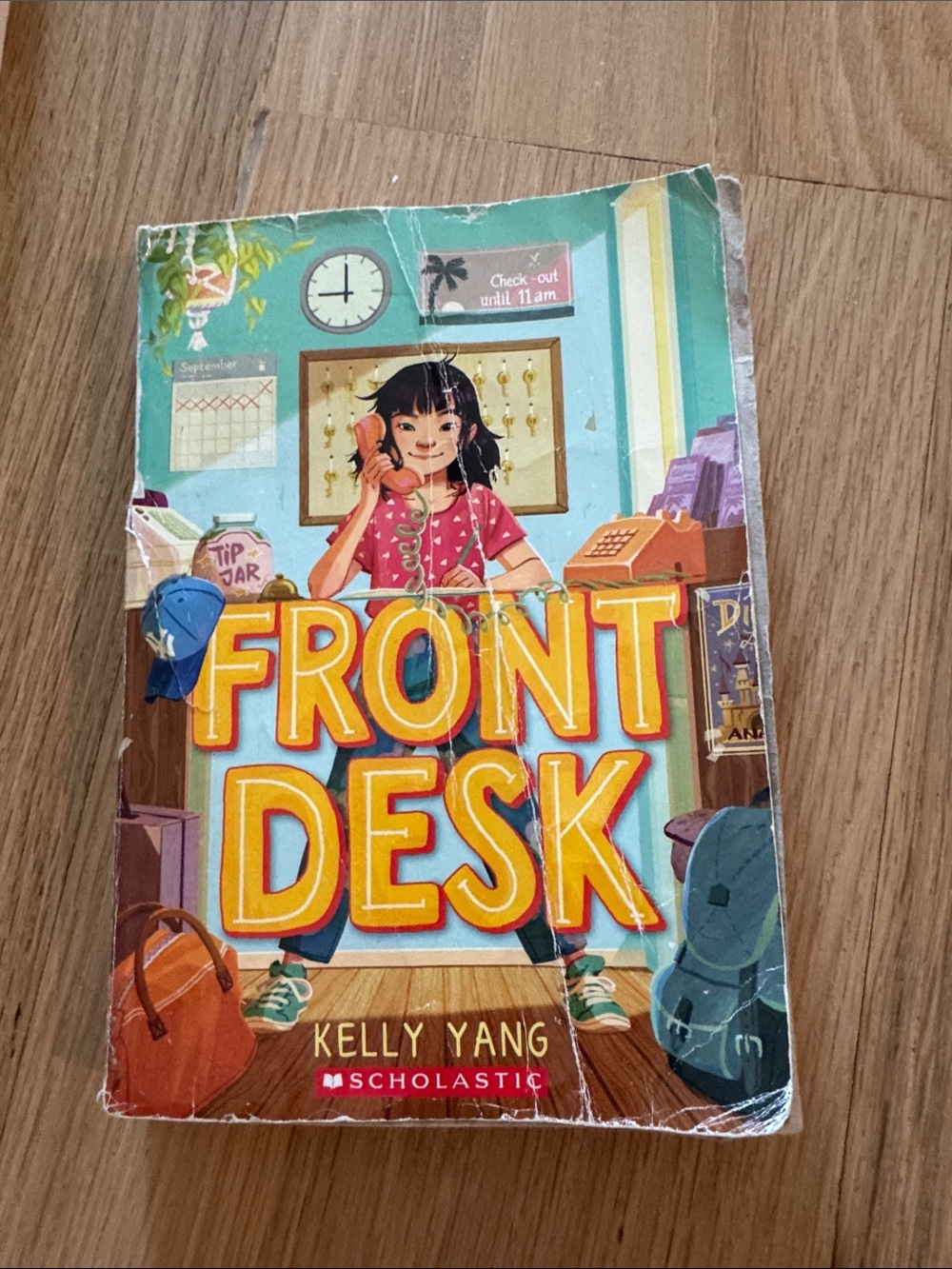 Scholastic Front Desk — Yellow & Teal Illustrated Cover